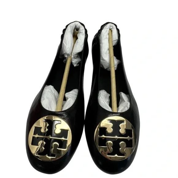 Tory Burch Black and Gold Flats with Decorative Emblems - Picture 1 of 4